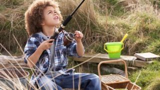 young boy fishing