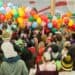 children celebrating with balloons