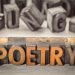 Word Abstract Text In Vintage Letterpress Wood Type Printing Blocks Against Grained Wood Color Combined With Black And White Image