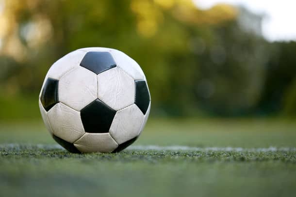 Sport Soccer And Game Ball On Football Field Soccer Ball On Football Field Marking Line