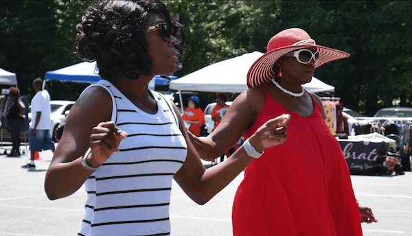 two women dancing at east side music festival in charlotte