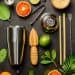 Cocktail Making Bar Tools Shaker Tropical Fruits And Leaves On A Dark Background Top View Cocktail Making Bar Tools Shaker Tropical Fruits And L