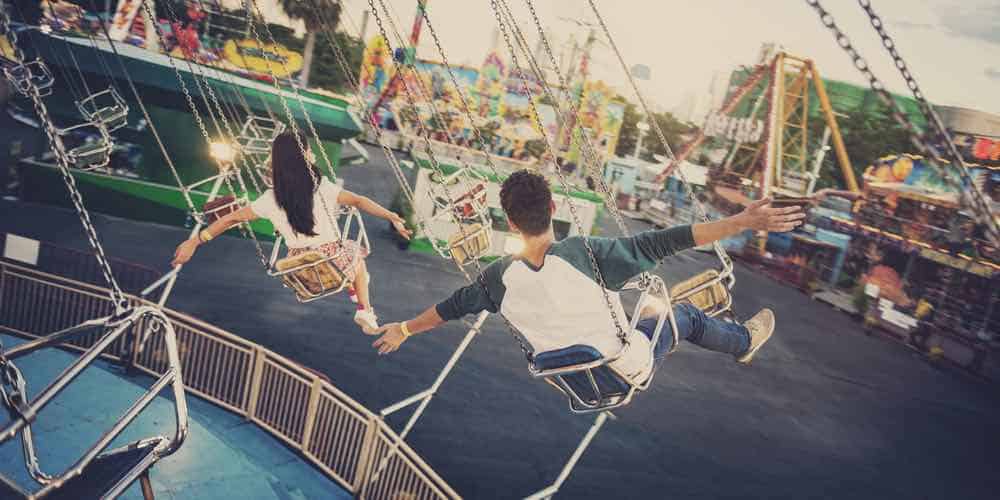 people on swing ride