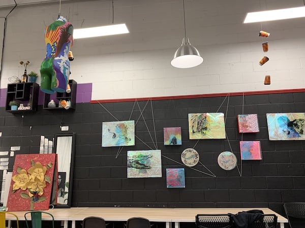 Sculptures and paintings at Dupp & Swat, a creative space in Camp North End in Charlotte