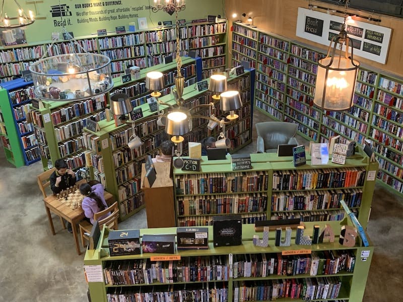 Children playing chess at used bookstore in Charlotte, NC