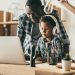 father and son at computer