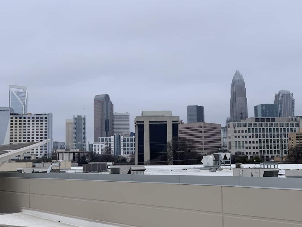 view of Charlotte skyline from rooftop parking deck
