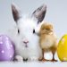 bunny and chick next to easter eggs