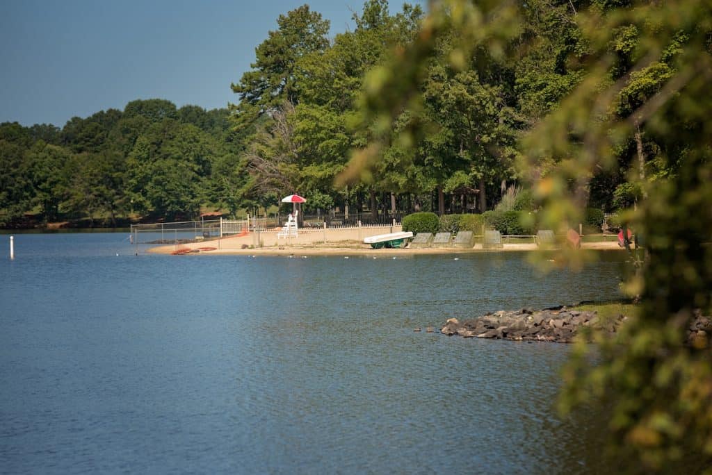 A lake with a small beach
