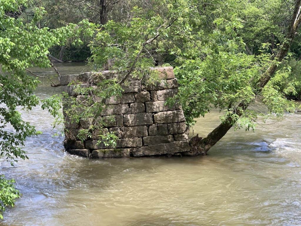 Remnants of old stone bridge in South Fork of Catawba River