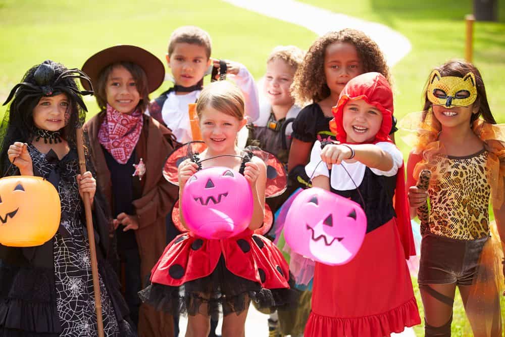kids in costume trick or treating