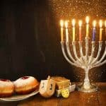 Menorah, donuts and dreidels for Hanukkah