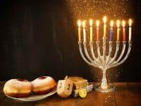 Menorah, donuts and dreidels for Hanukkah