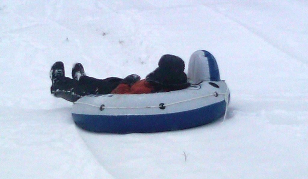 Sledding with a river tube. Taken in January, 2010 in Charlotte, NC