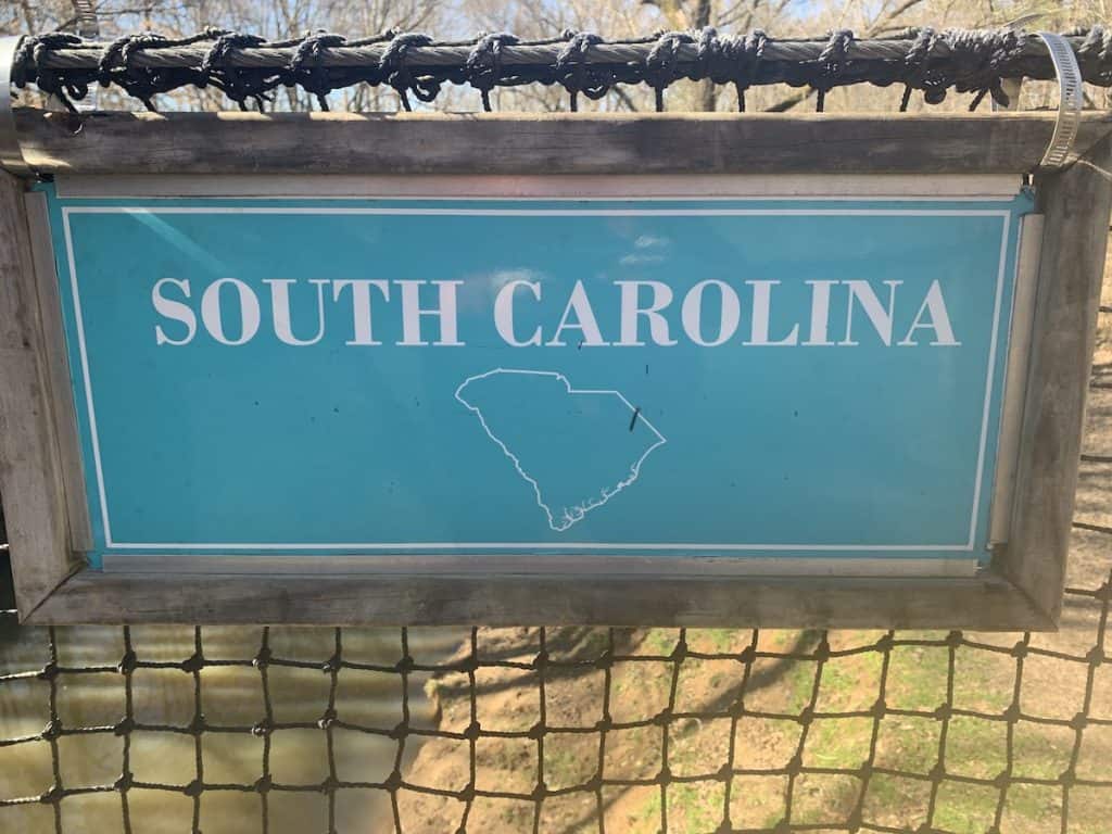 South Carolina sign on suspension bridge over 12 Mile Creek