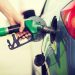 person pumping gas