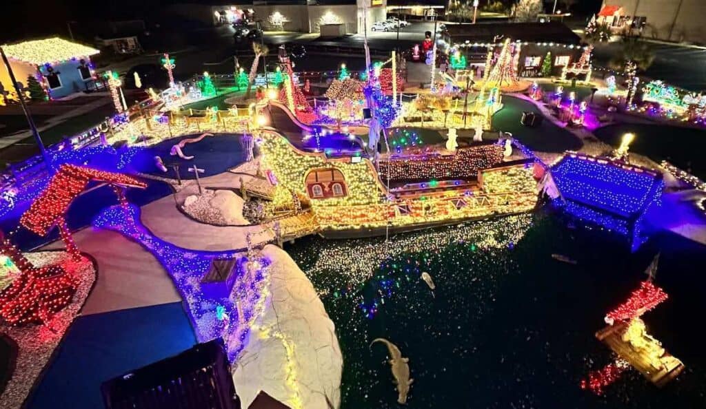 Pirate themed miniature golf course decorated with Christmas lights