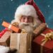Santa holding lots of presents