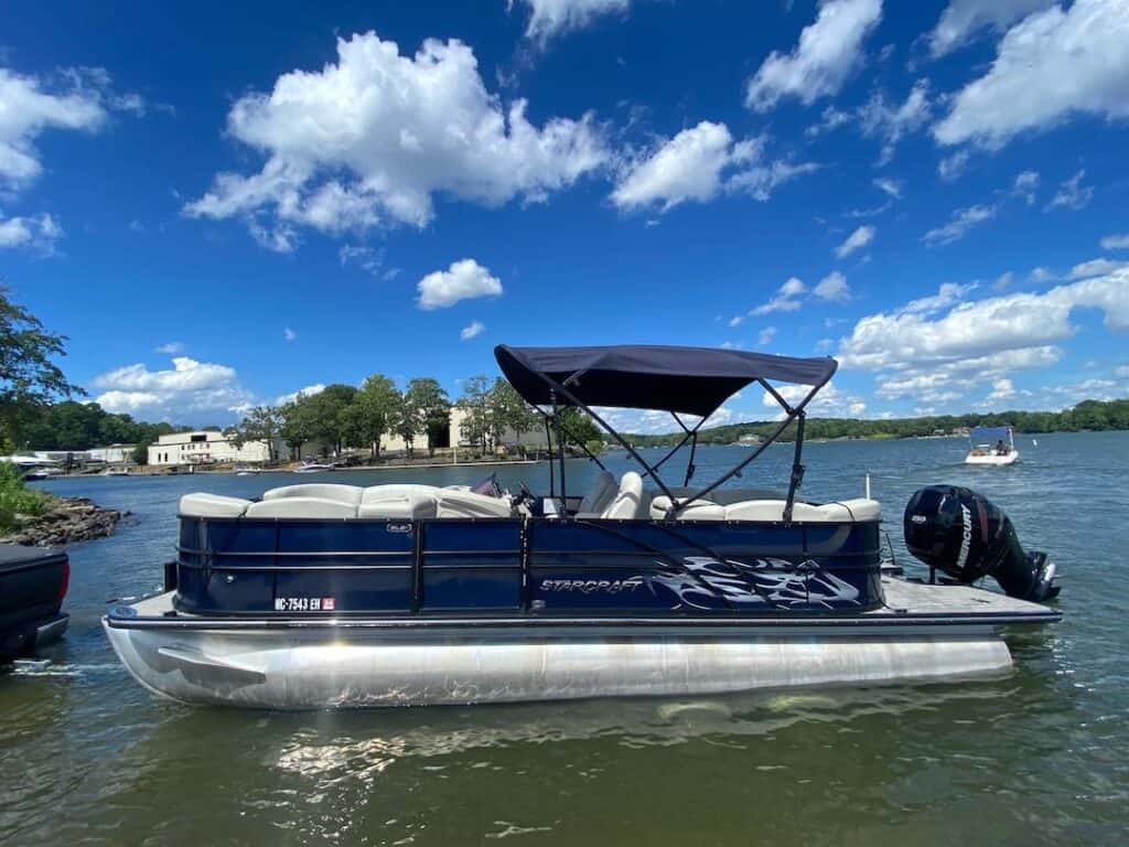 blue and white boat in a lake