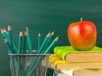 apple, books, pencils, chalkboard