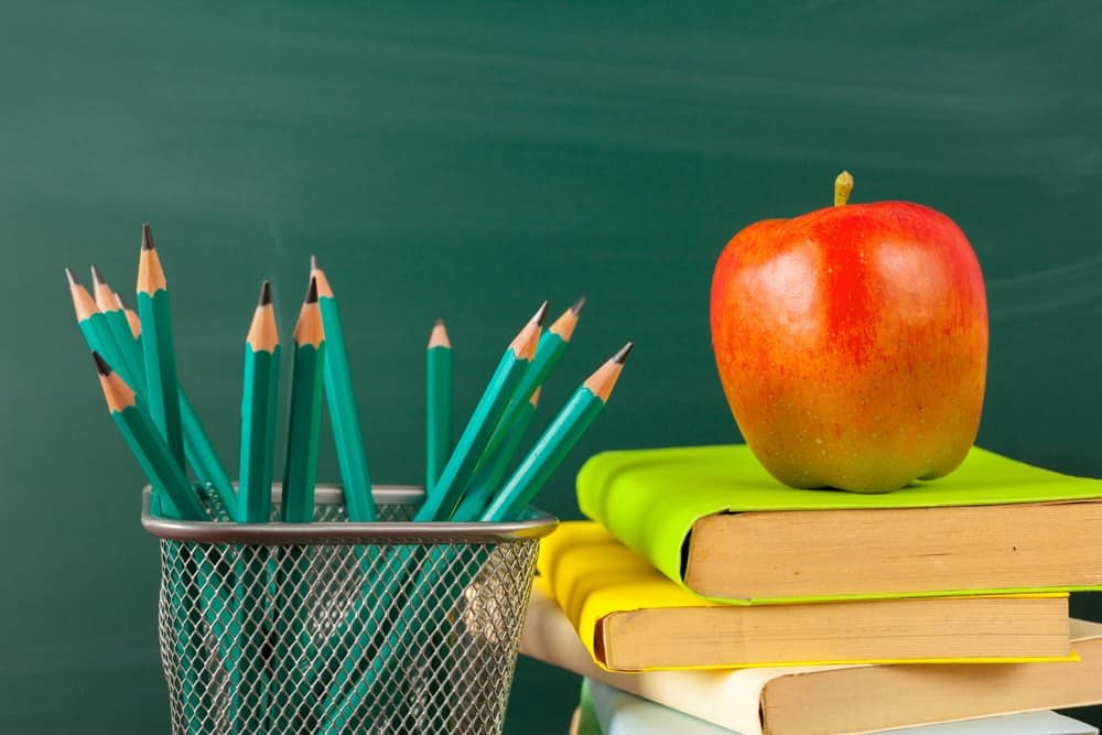apple, books, pencils, chalkboard