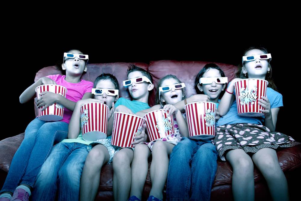 little kids watching movies with 3d glasses