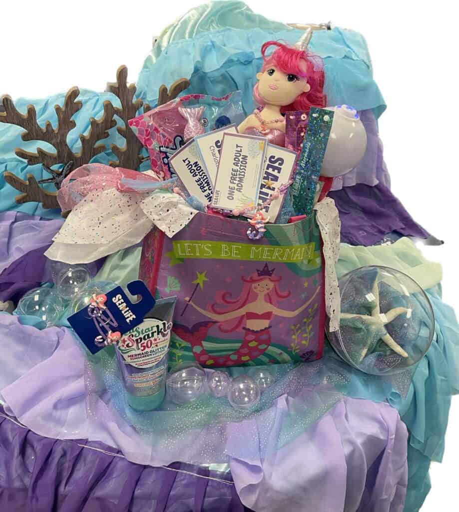 prize pack to SEA LIFE Charlotte-Concord's mermaid event, including tickets, plush mermaid and more