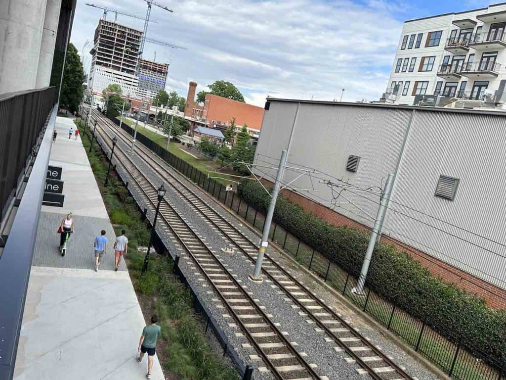 view of Rail Trail and train tracks from Sycamore Brewing