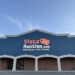 Building with Vista Auction sign