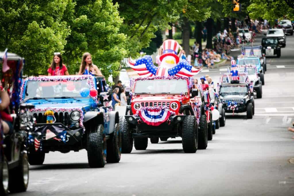 Decorated vehicles in Baxter Village's 4th of July parade