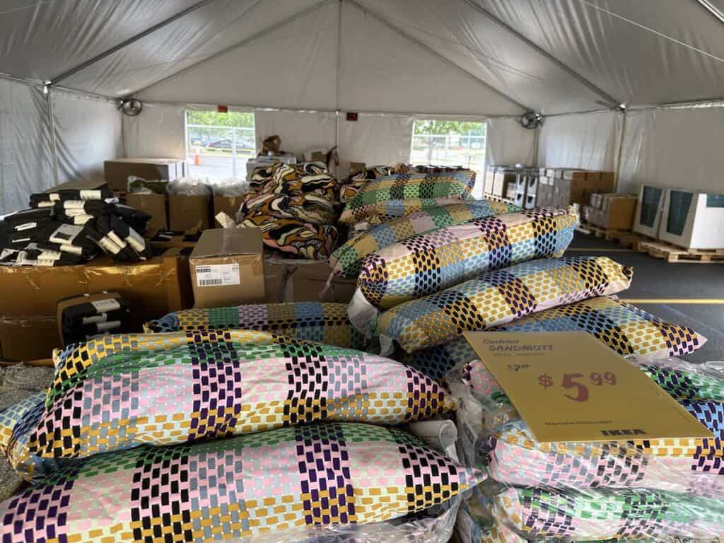 Interior of IKEA tent sale with cushions and pillows