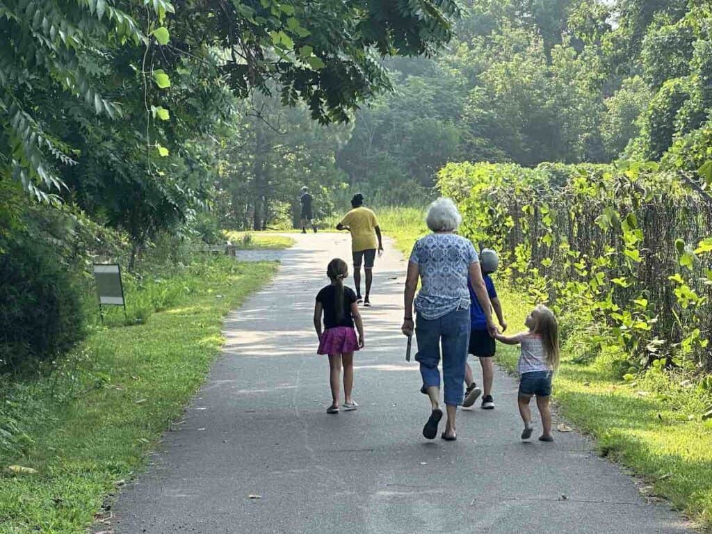 Families walking on Kings Mountain Gateway Trails