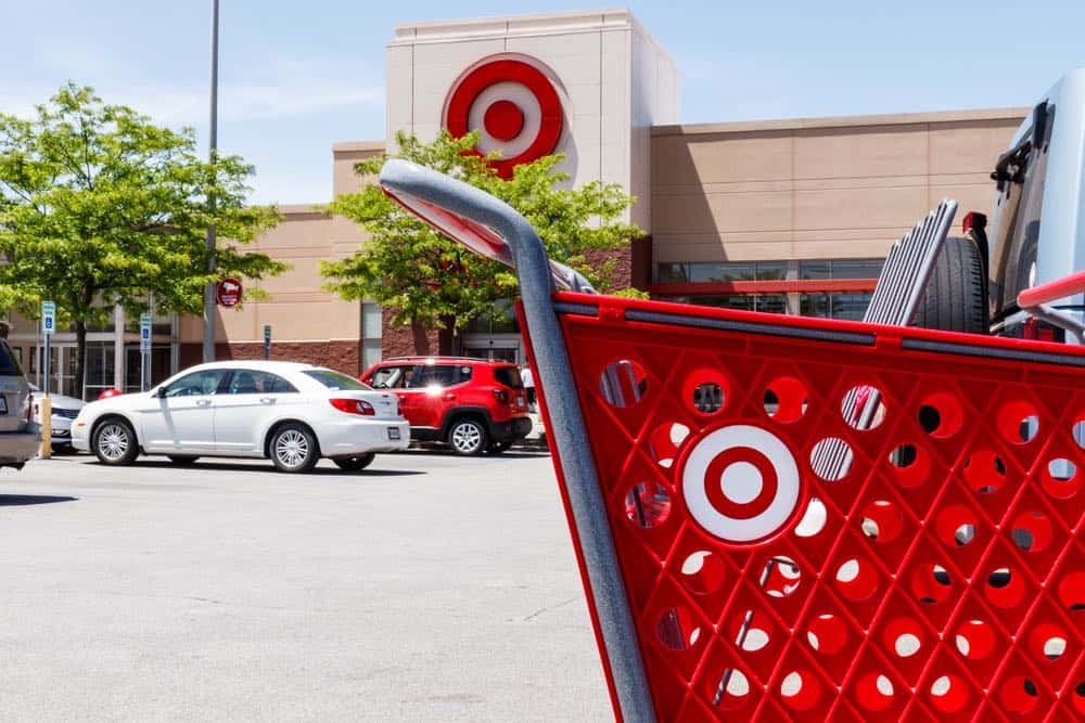 red Target shopping cart in parking lot of Target