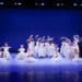 Children dancing on a stage