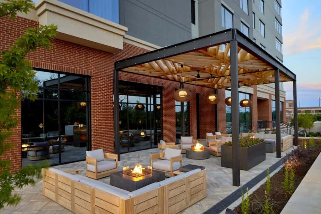 firepits on a patio outside of Golden Owl Tavern