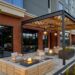 firepits on a patio outside of Golden Owl Tavern