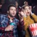 scared couple in movie theater