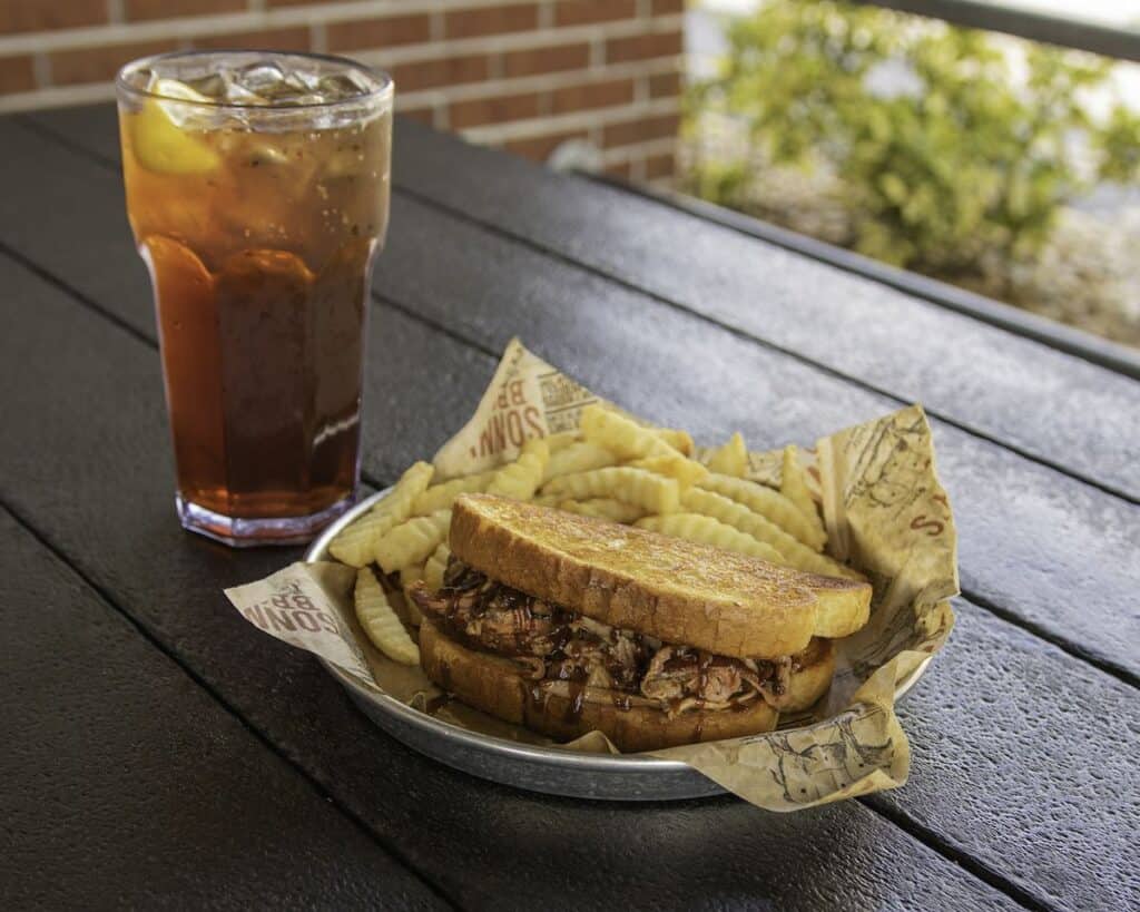 Sonny's pulled pork sandwich, fries and drink