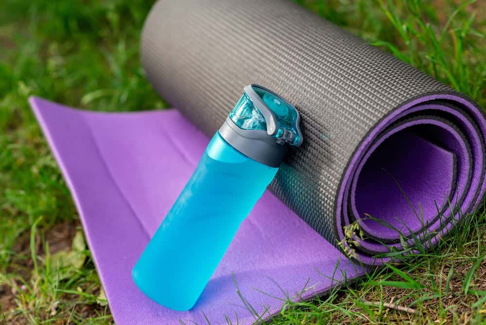 yoga mat and water bottle outside