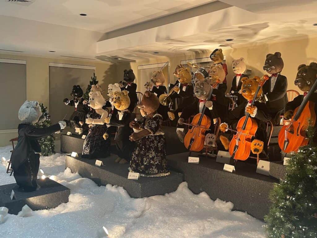animatronic bear orchestra playing holiday tunes