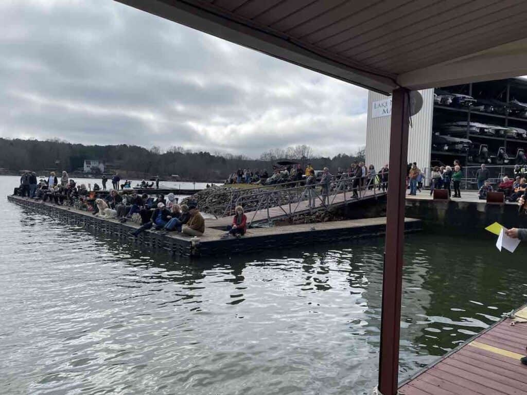 spectators watching waterskiing competition