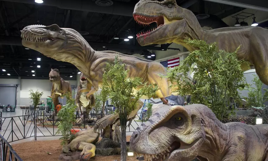 3 large animatronic dinosaurs
