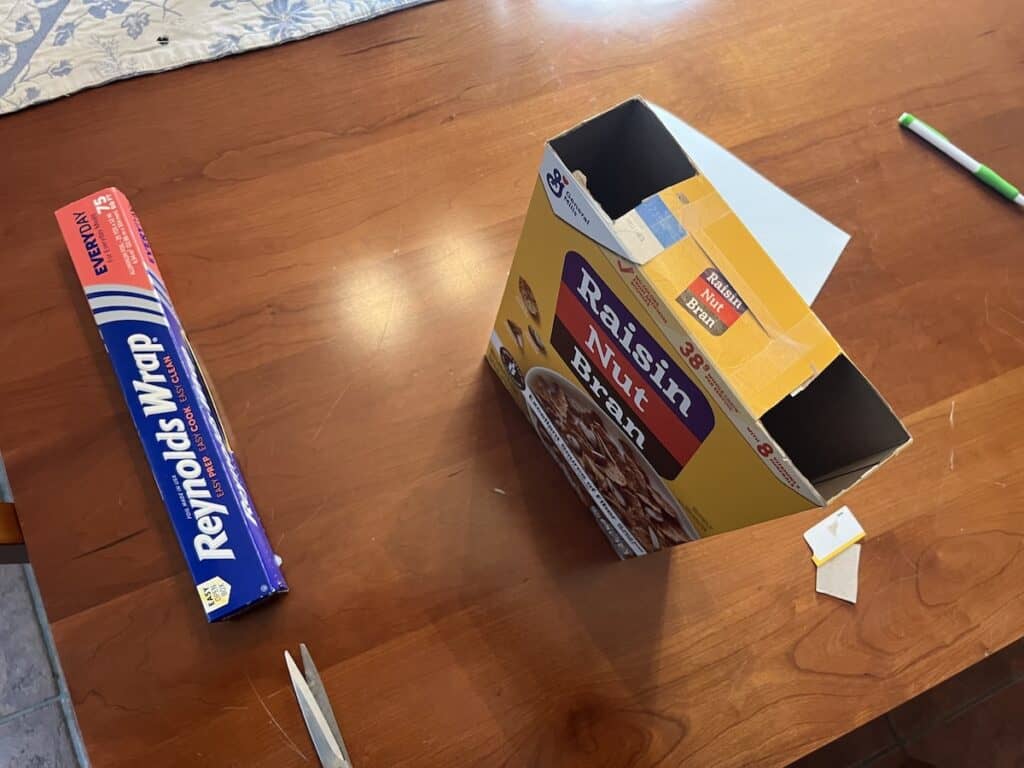 Cereal box with two openings