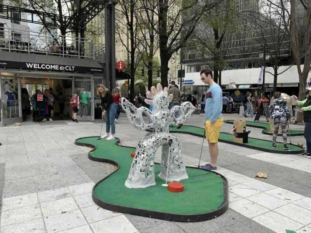 people playing mini golf in Charlotte