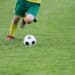 kid playing soccer