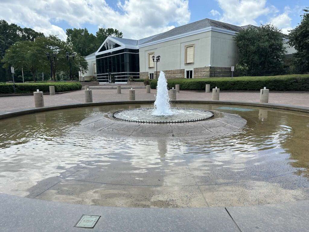 exterior of Mint Museum Randolph, with fountain in the foreground