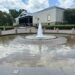 exterior of Mint Museum Randolph, with fountain in the foreground