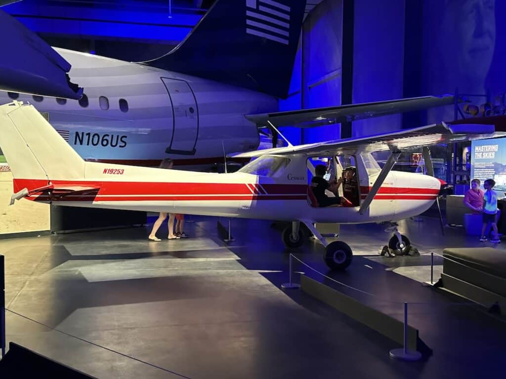 child in plane at Sullenberger Aviation Museum