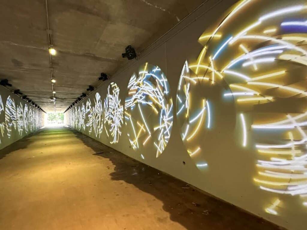 Projected art in pedestrian tunnel under I-77 in Huntersville, NC