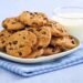 Plate of chocolate chip cookies with milk